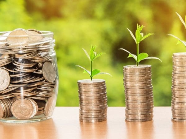 image of coins arranged to depict increased savings as a result of renewable heating