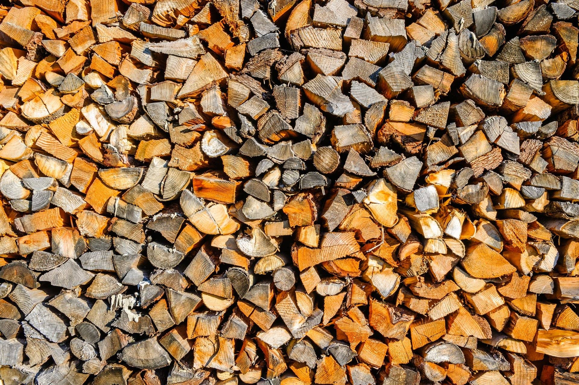 Biomass Boiler Warranty, wood chips used in a Biomass Boiler chopped and stacked neatly