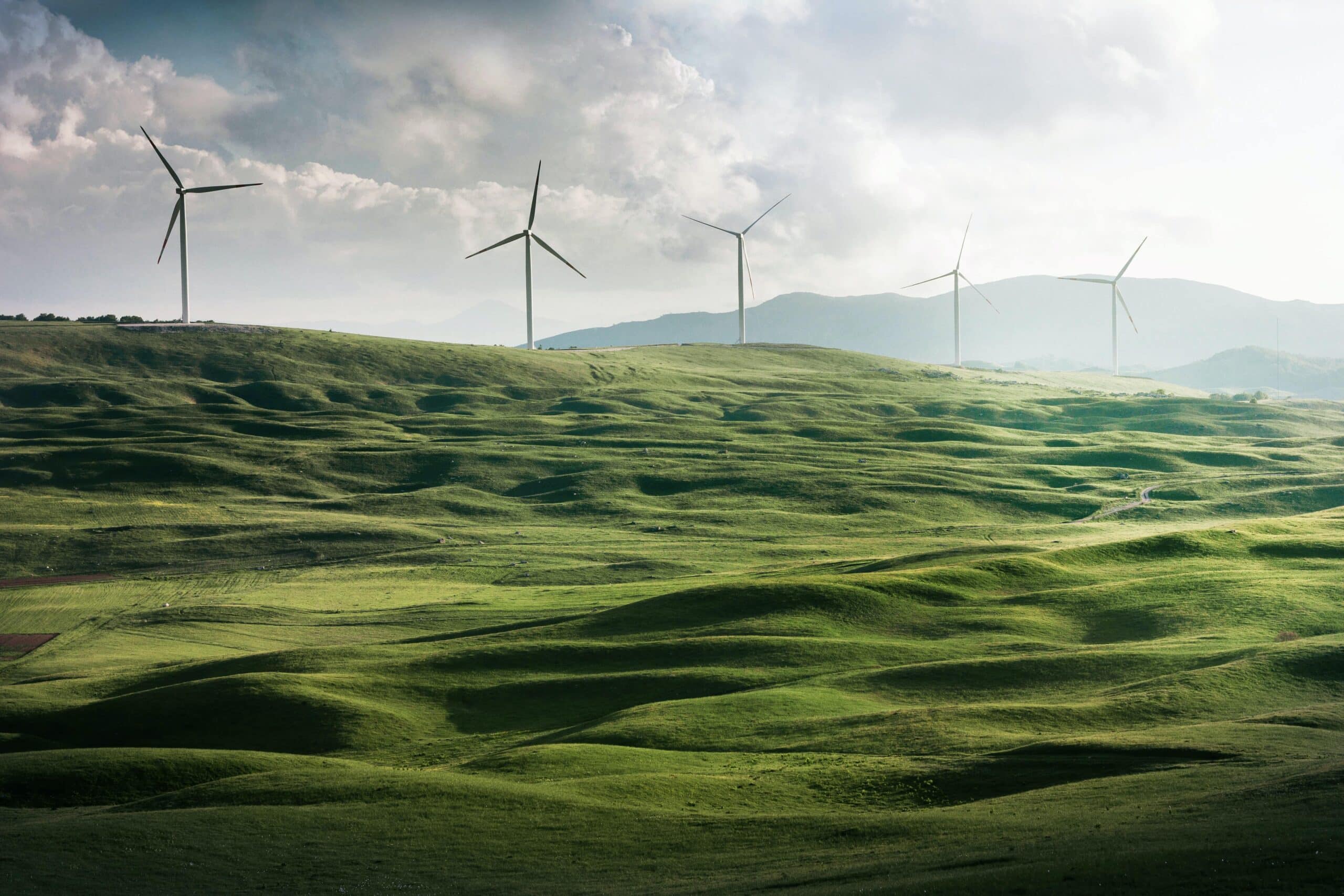 what is energy efficiency; 5 windmills on a grassland