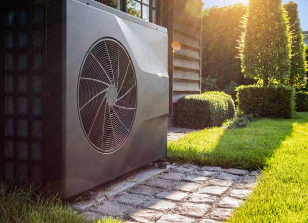 Office heating for winter, a condenser outside a home.